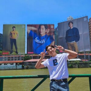 Ji Chang Wook poses in front of his billboards in Manila, Philippines.