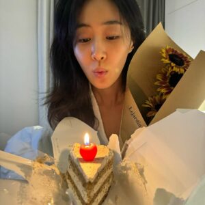 Kwon Yuri posts a photo blowing a cake candle via Instagram @yulyulk.